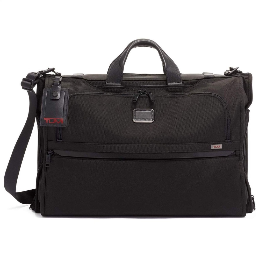 Tumi tri-fold garment bag, carry-on bag